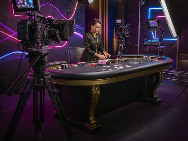 six6s + Camera and studio lighting facing a casino table