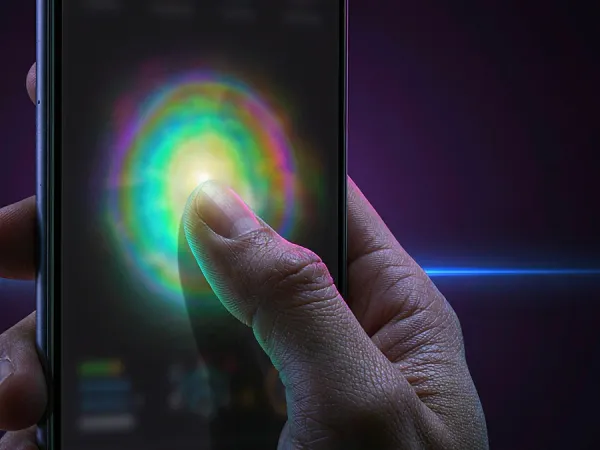 six6s + Finger touching a glowing circle on a phone screen